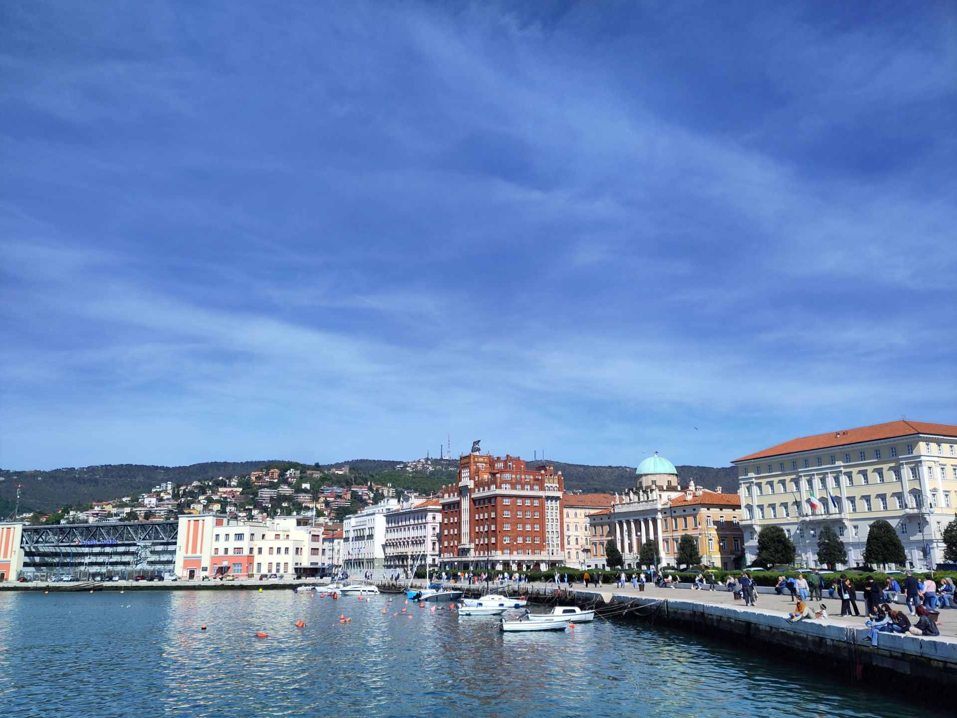 A view from the pier of the Trieste shoreline, on a very sunny day.